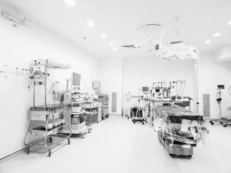 An equipped operating room, used as an illustrative clinical setting.